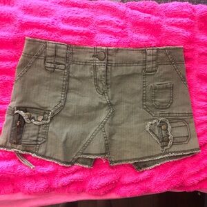 Green y2k “Have” cargo mini skirt with lots of pockets and zipper details